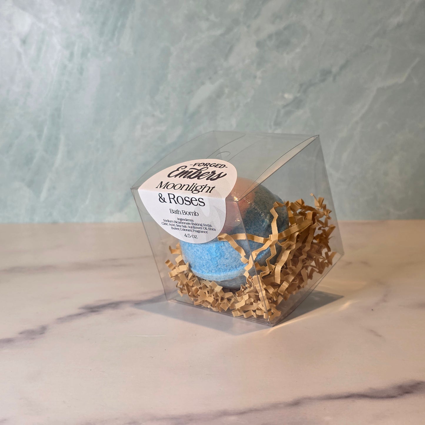 Moonlight & Roses Bath Bomb Drift into a dreamy nighttime garden with this elegant blend of fresh hydrangea and delicate rose petals. As it fizzes, your bath fills with a light, enchanting floral aroma that feels calming, romantic, and effortlessly luxurious. Perfect for unwinding, pampering, or adding a little bit of moonlit charm to your self-care routine.