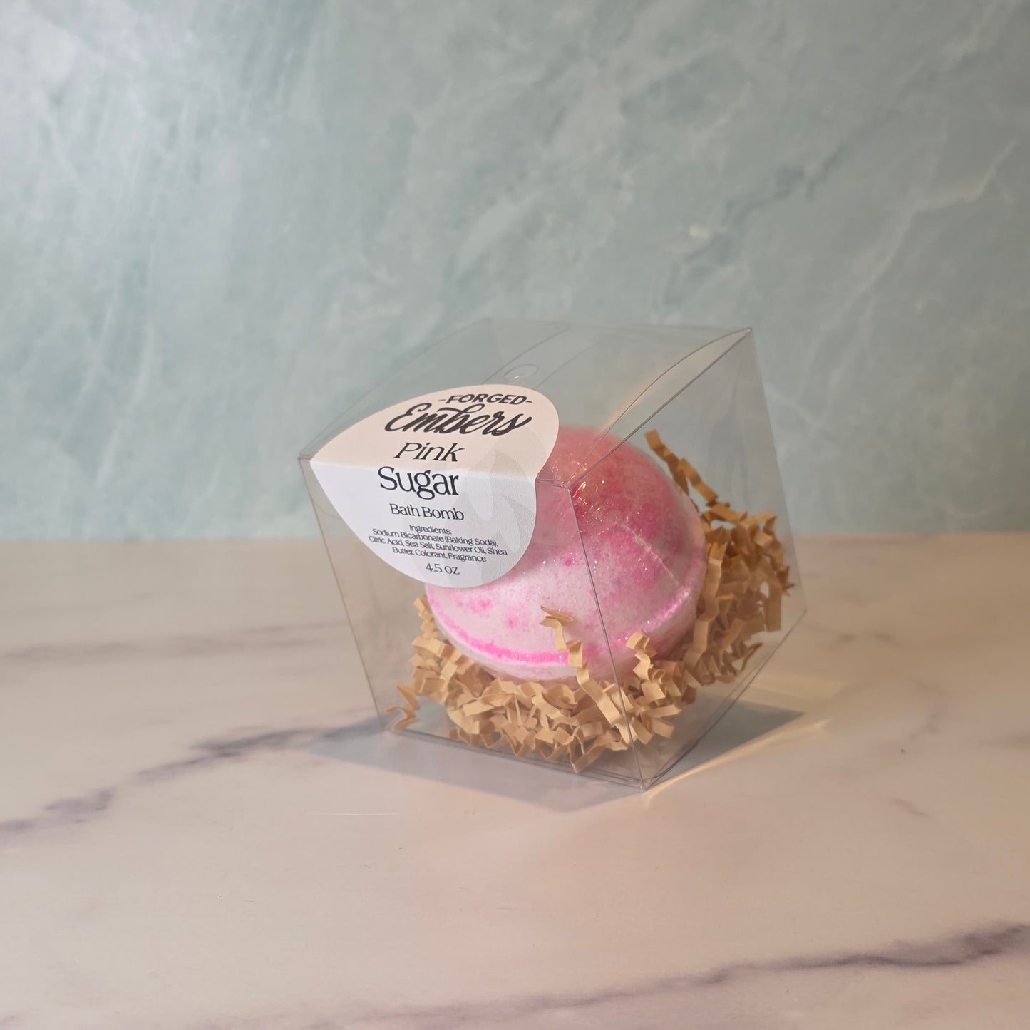 Indulge your senses in a sugar-spun dream. This bath bomb bursts with the nostalgic sweetness of cotton candy, creamy caramel, and raspberry jam, brightened by a pop of lemon drops and grounded with a soft touch of musk. Drop it in, watch it fizz, and let your entire bath smell like pure pink sweetness.