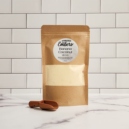 Banana Coconut Milk Bath with nourishing bath and body blend included wooden scoop.