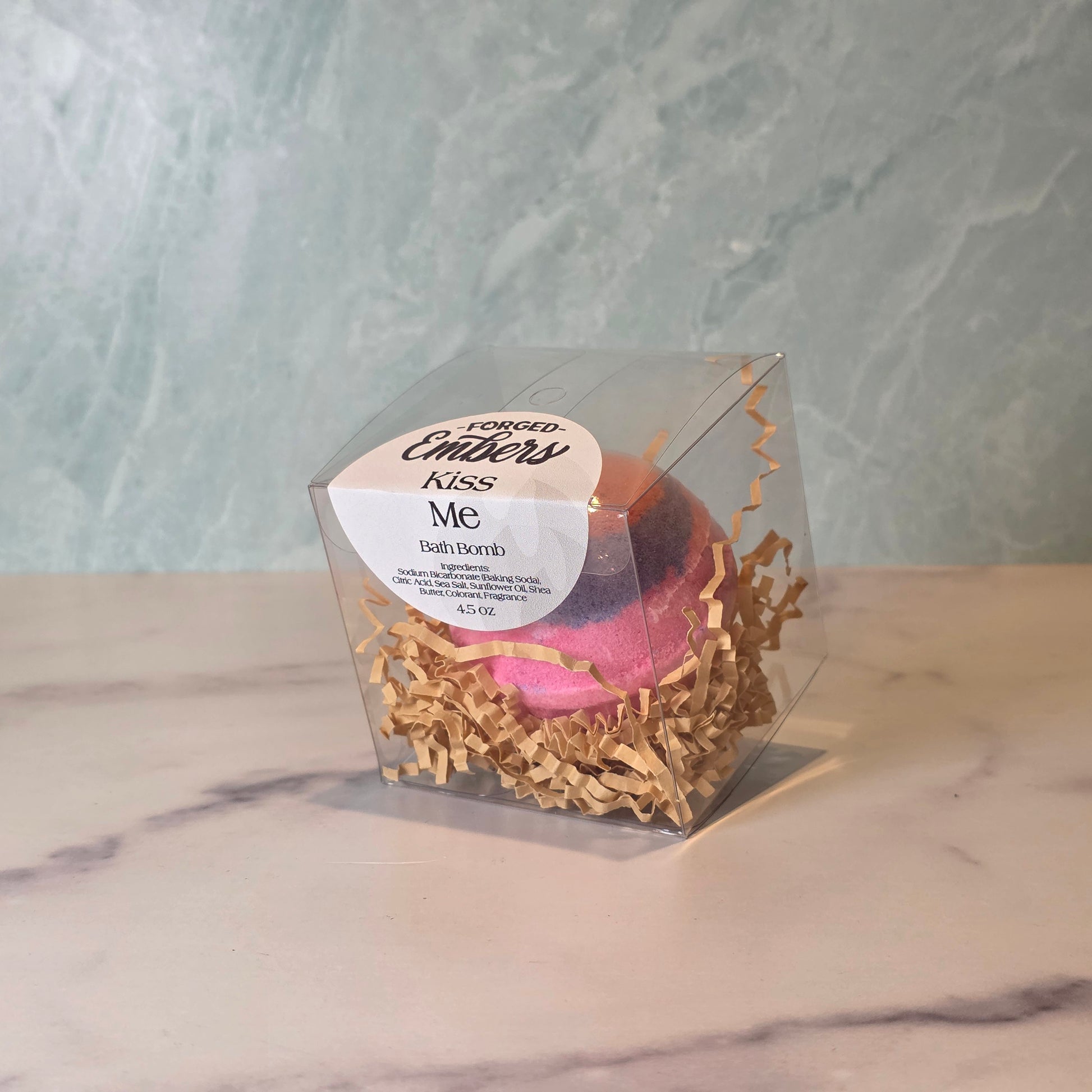 Kiss Me Bath Bomb
Fall into a dreamy, floral escape with this enchanting blend of jasmine and lily, wrapped in bright hints of crisp apple and zesty lime. As it fizzes, your bath fills with a sweet, romantic aroma that feels flirty, fresh, and totally kiss-worthy. Perfect for unwinding, pampering, or setting a mood.